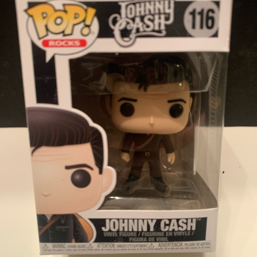 Funko Pop Rocks Figure in Black and Brown